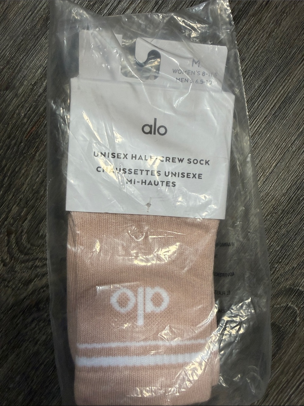 ALO Yoga Half-Crew Socks in Blush Pink with White Logo